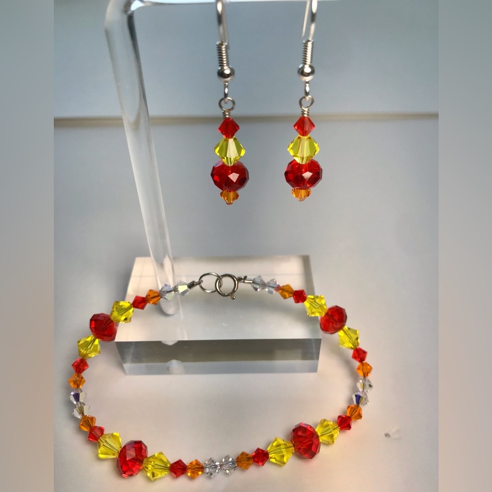 Handcrafted crystal beaded bracelet and earrings set.